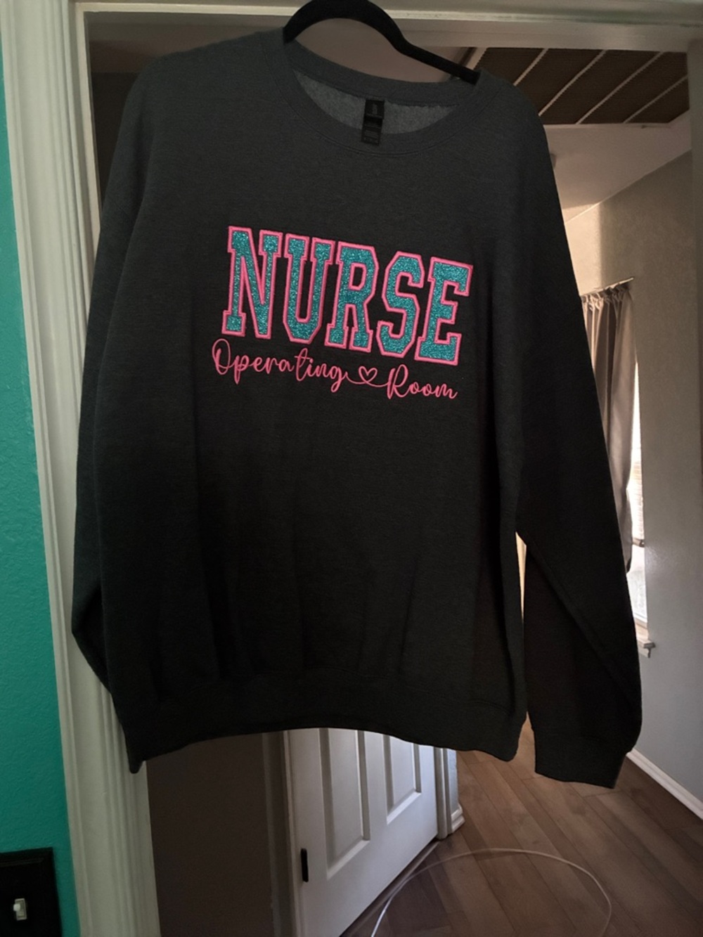 Gildan Dark Gray Crewneck Sweatshirt with Pink and Teal Nurse Lettering
